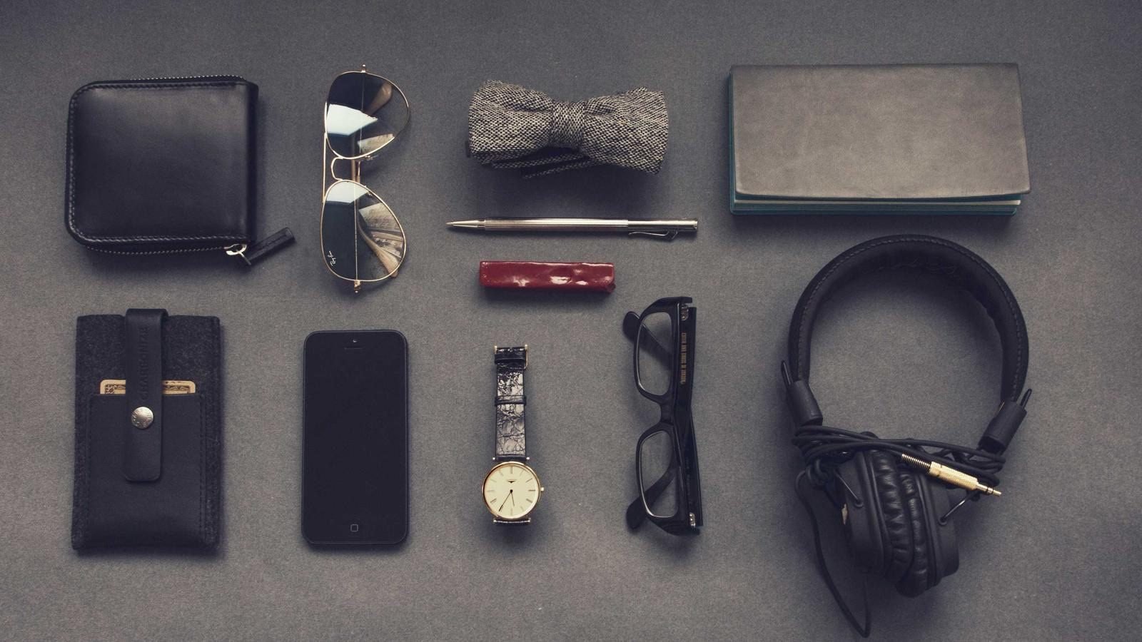 Executive travel essentials arranged on a table